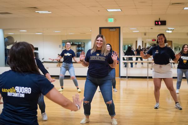 several people completing group fitness class